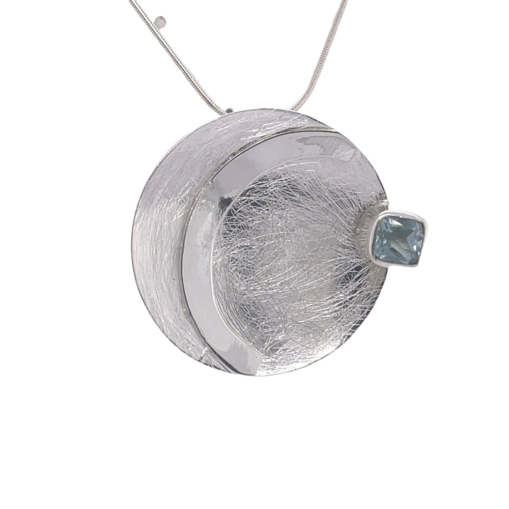 STERLING SILVER DISC PENDANT BLUE TOPAZ CHAIN NOT INCLUDED