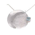 STERLING SILVER DISC PENDANT BLUE TOPAZ CHAIN NOT INCLUDED